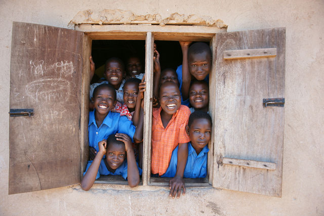 Taken in a school in Uganda.  This youn boys were so happy to have their picture taken.  This was at a God Loves Kids school.