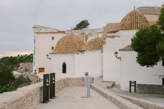 Scenic view of historic white-washed buildings in Ibiza, Balearic Islands, Spain.