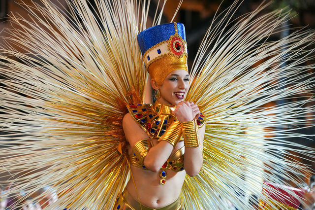 Blue and gold in the Egyptian manner, arms wide