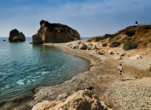 people walking on beach shore during daytime
