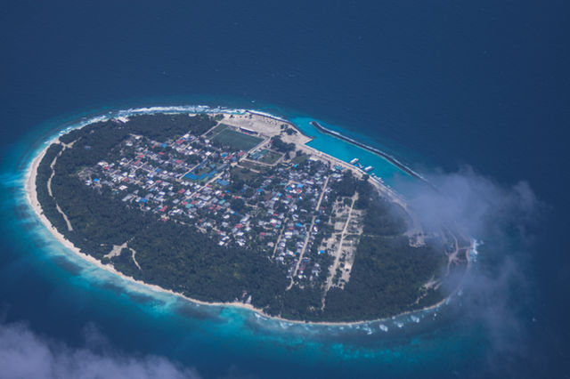 A small island in the middle of the ocean