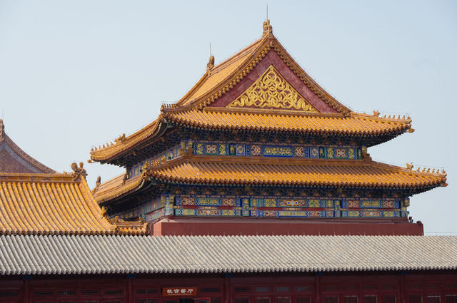 Detailed view of ornate rooftops in the historic Forbidden City, Beijing.