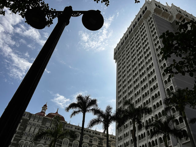 a street light in front of a tall building