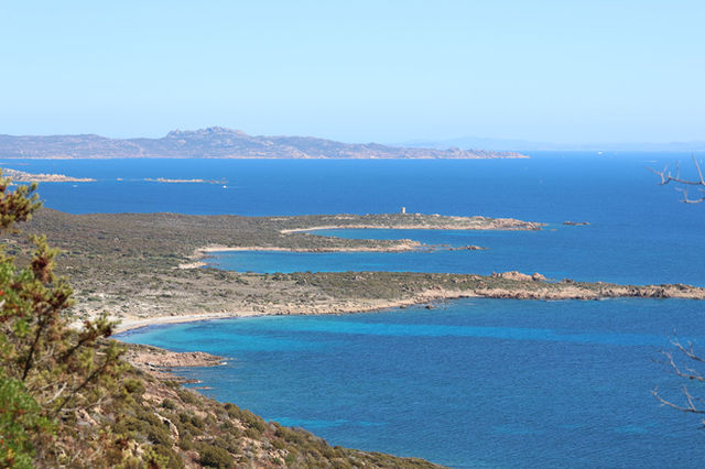 A breathtaking view of the rugged coastline and turquoise waters of Sardinia.