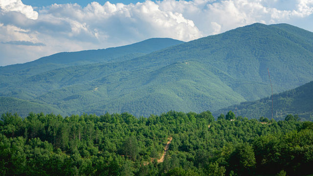 a view of a mountain range from a distance