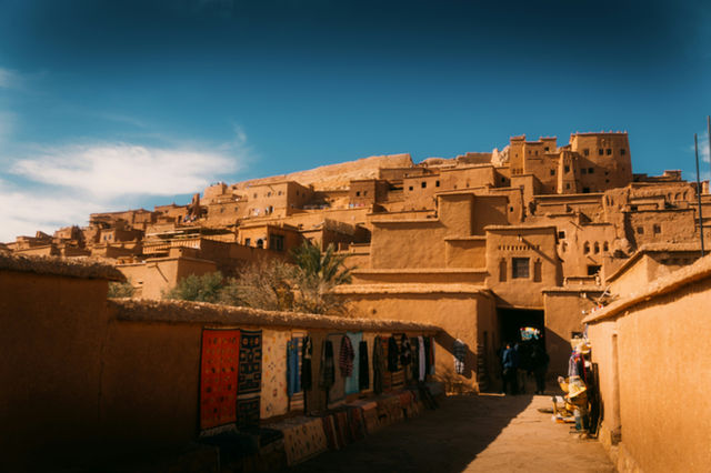A city with a lot of brown buildings
