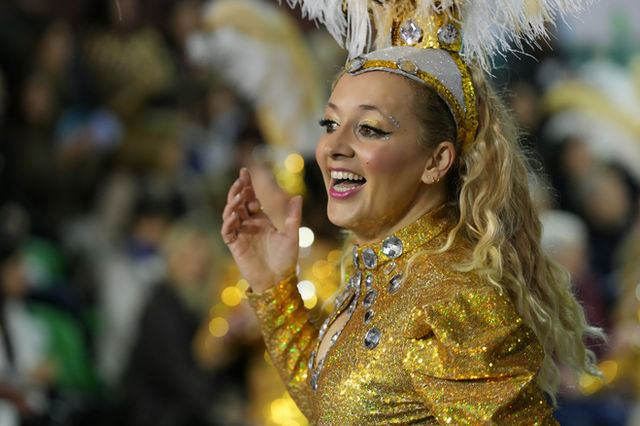A golden costume and a broad smile — the Madeira carnival