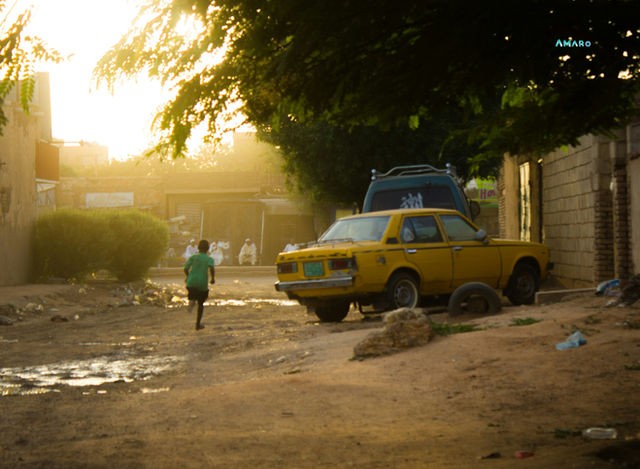 a kid playing at afternoon