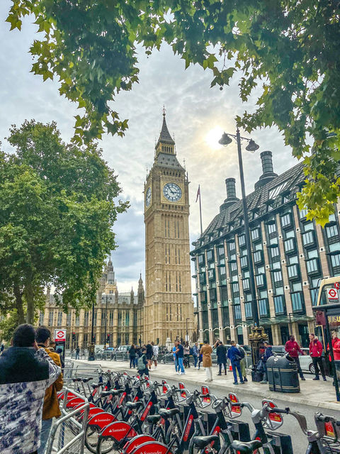 a large clock tower towering over a city