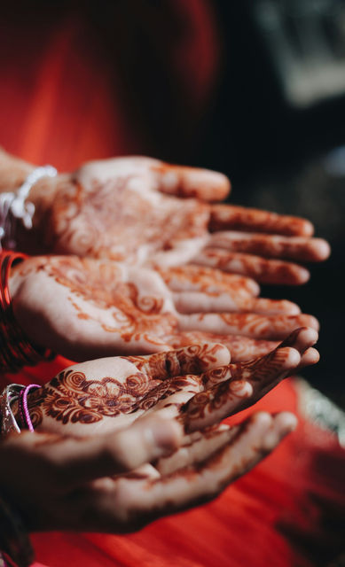 Mehndi drying on open hands