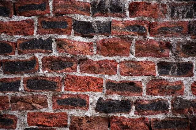Brick wall in León, Guanajuato, Mexico, in the old part of town, in an abandoned building, in the early morning of a sunday