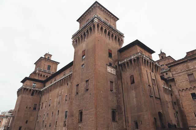 A stunning view of the medieval Castello Estense in Ferrara, Italy, showcasing its historical architecture.