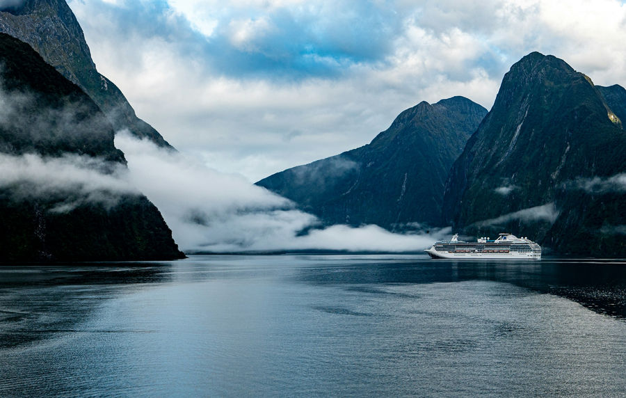 a cruise ship in the middle of a body of water