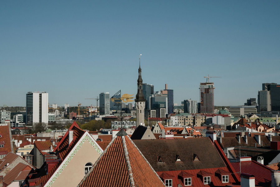 High-Angle View of the Medieval Red Rooftops and Holy Spirit Church Tower in Tallinn Old Town