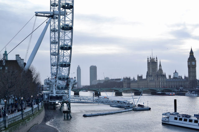 A side view of the London Eye, showing Houses of Parliament and the Big Ben, as well as Thames. Circa 2012.