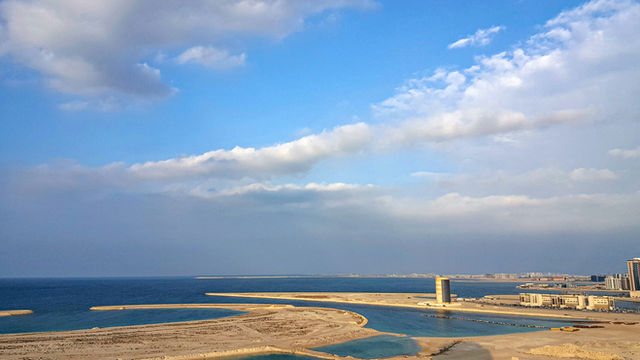 A rare cloudy day of seaside view of Bahrain