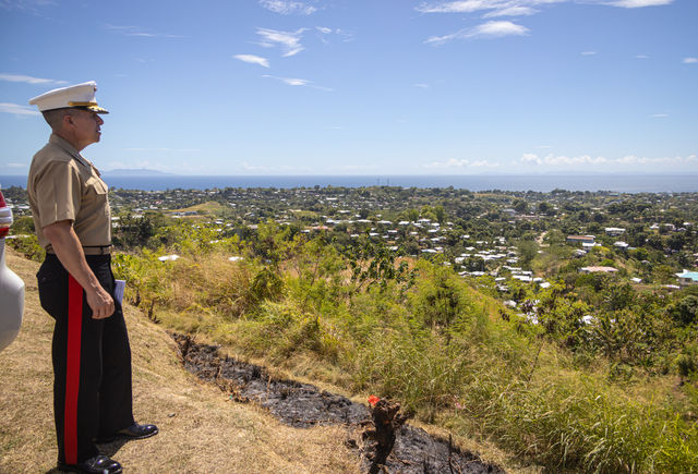 U.S. Marine Corps Maj. Gen. Benjamin T. Watson, 1st Marine Division commanding general, looks over Bloody Ridge in the Solomon Islands after a ceremony commemorating the 80th Anniv