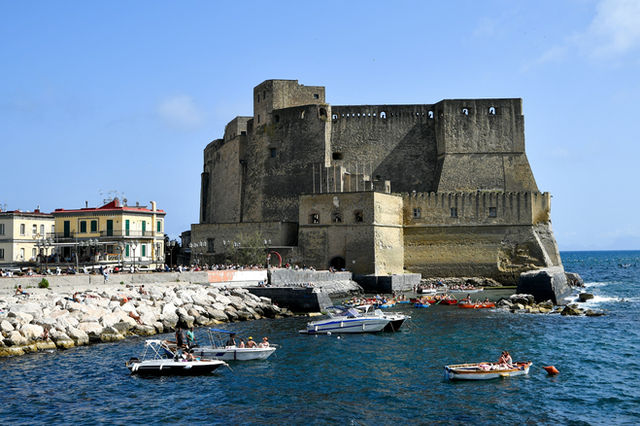 Castel dell'ovo fortress on the naples waterfront with boats