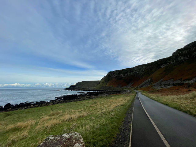 Road down to the Giant's Causeway and red cliff face
