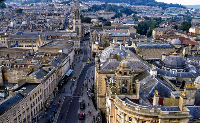 A stunning aerial view of Bath, England showcasing its historic architecture and bustling streets.