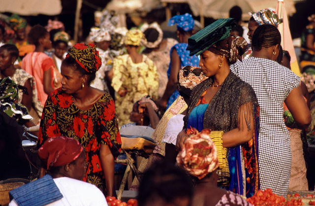 women shopping at a market in Senegal