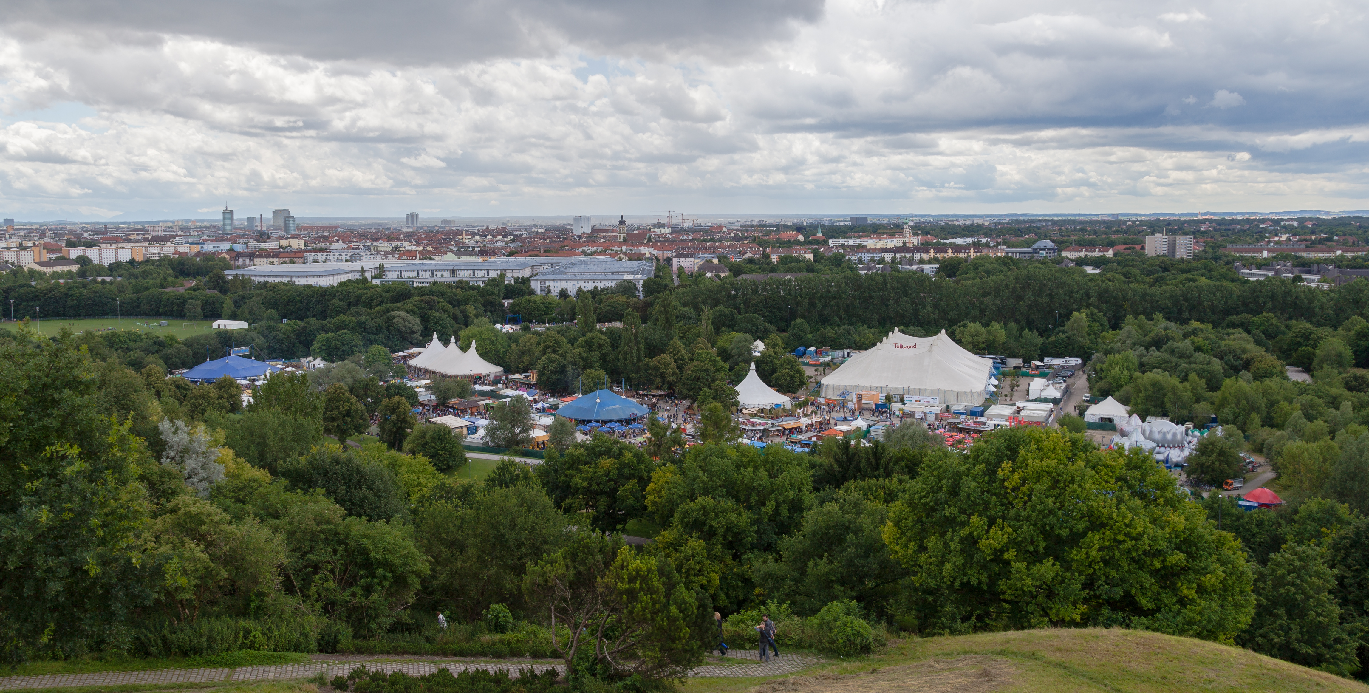 Stalls and visitors at Tollwood festival, Munich