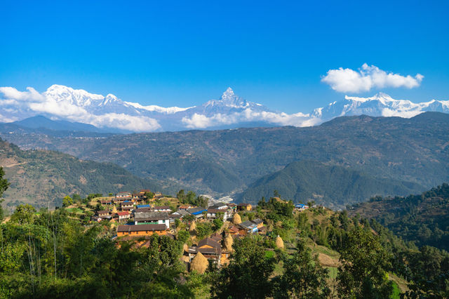 There are still places in Nepal that are untouched by tourism. Village near Pokhara, with Mount Fishtail in the background.