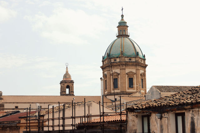 Beautiful view of a historic church dome in Palermo, Sicily, showcasing traditional architecture.