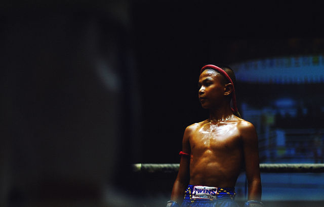 A Muay Thai boxer training