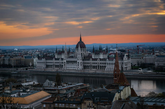 Orszaghaz building in budapest at sunset