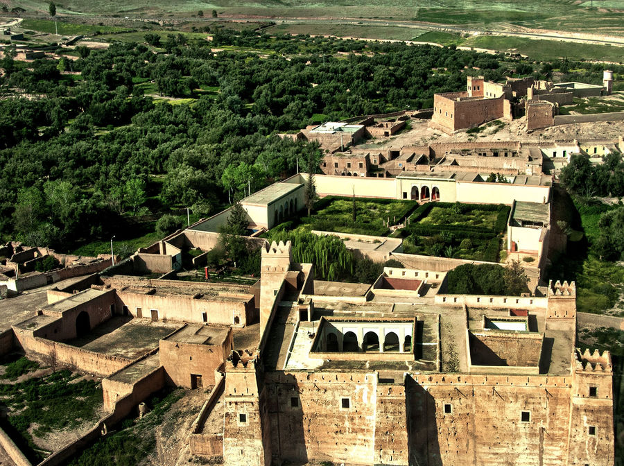 Explore the stunning bird's-eye view of Marrakech's historical architecture and lush landscapes.