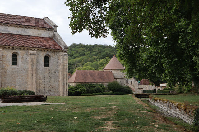 Charming abbey near lush forest in Montbard, Burgundy region, France.