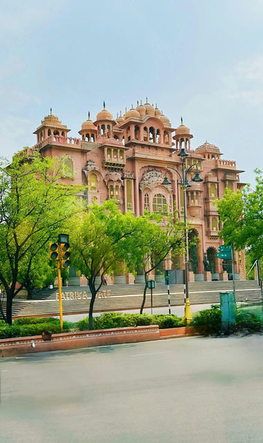 Patrika Gate from the avenue, framed by trees