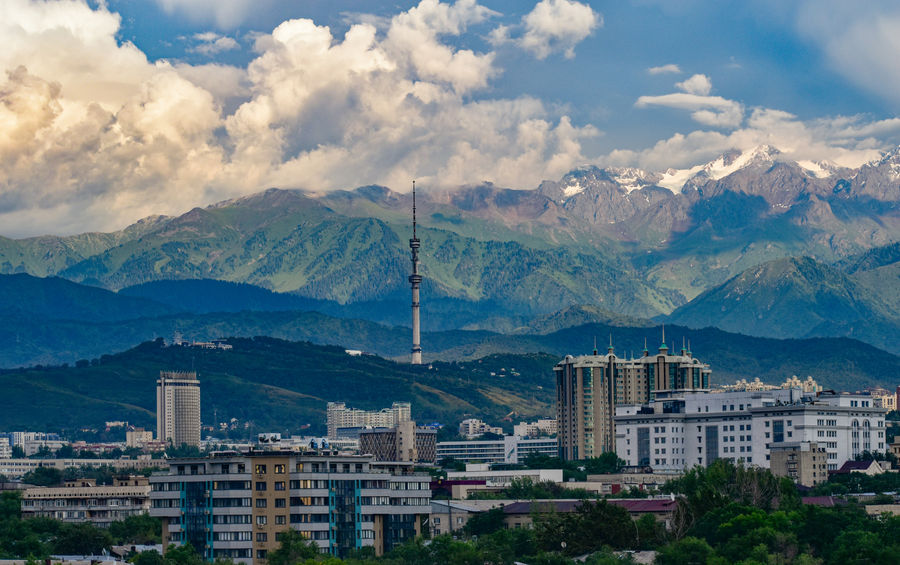 a city with a mountain in the background
