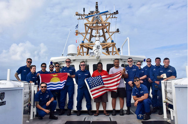 The USCGC Oliver Henry (WPC 1140) crew and Kiribati Police Maritime Unit officers and recruits stand for a photo in Tarawa, Kiribati, on Feb. 16, 2024. For the first time since 201