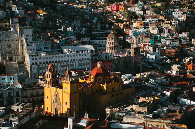 Vibrant aerial view of Guanajuato City, highlighting the iconic Basilica de Nuestra Señora de Guanajuato.