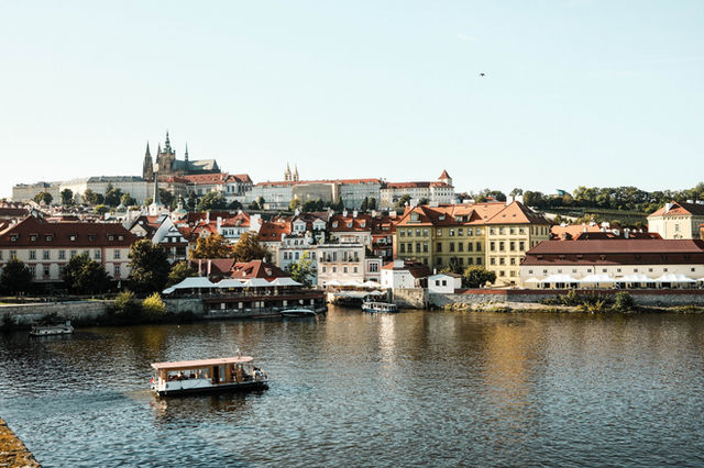 Picturesque view of Prague Castle and Vltava River in Prague, Czechia.