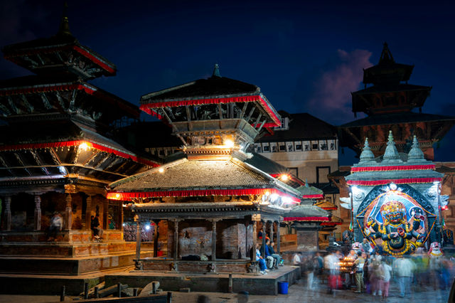 The impressive Durbar square in Kathmandu in the evening, in Basantapur. With the Bhairab statue on the right.