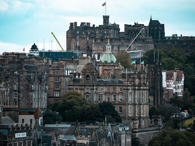 Breathtaking view of Edinburgh cityscape with Edinburgh Castle in the background.