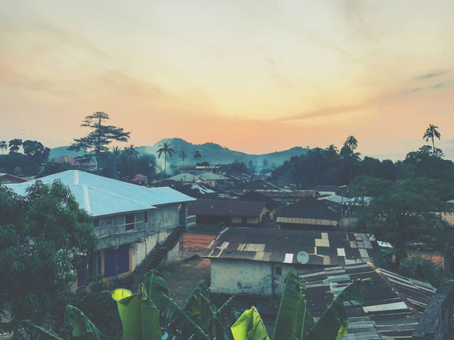 After several days trekking out in the jungle of Sierra Leone, we had made our way back to town. We ended our trip by heading to a local bar, which was hidden down an alley - through someones house an