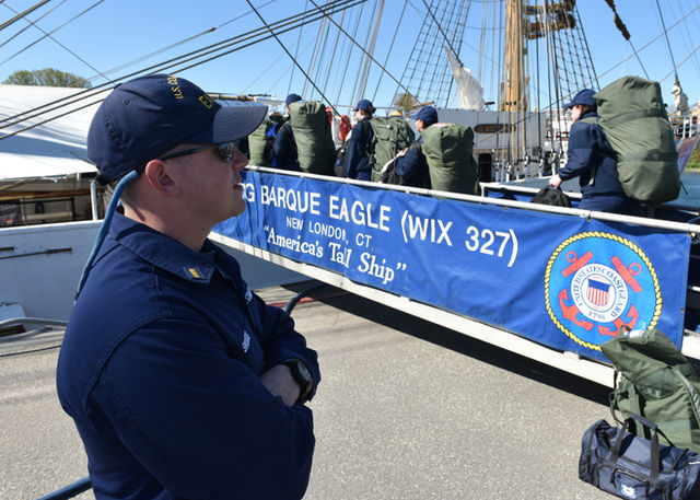 Ensign John Snuggs supervises the arrival of the Coast Guard Academy cadets aboard the Coast Guard Tall Ship Eagle (WIX 327) in Kiel, Germany, May 13, 2019. The Eagle serves as the
