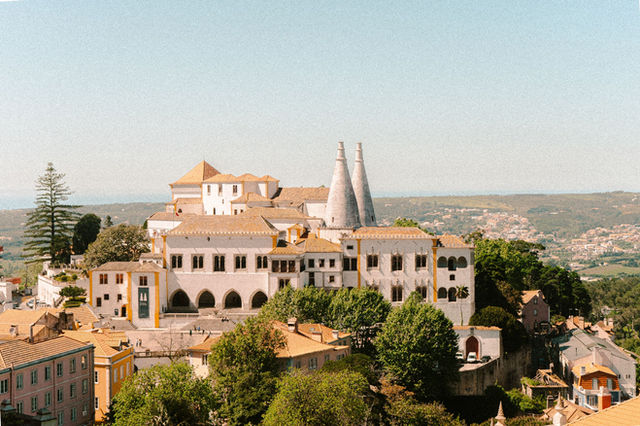 Beautiful view of Sintra National Palace, Lisbon, highlighting its unique architecture and scenic surroundings.