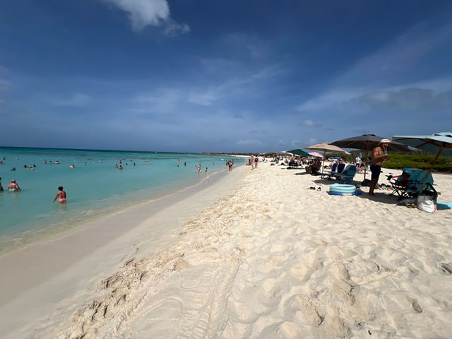 Turquoise water and pale sand at Arashi Beach on Aruba's calm northwest coast