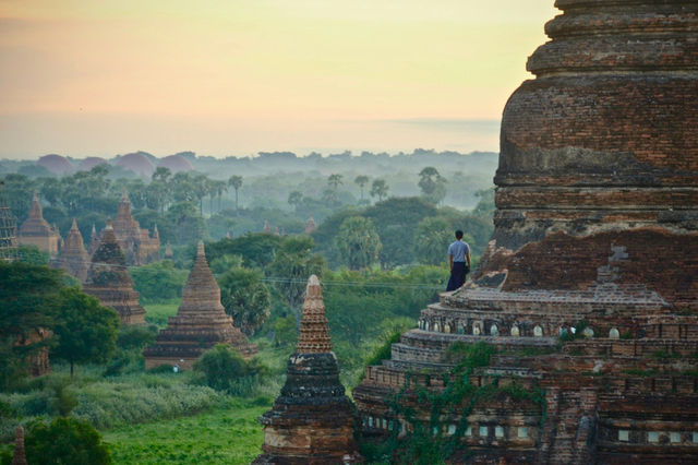Watching sunrise in Bagan with the hot air ballons rising in the sky.