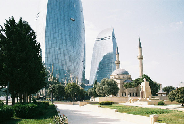 A view of The Alley of Martyrs Mosque as well as the iconic Fairmont Baku Flame Towers