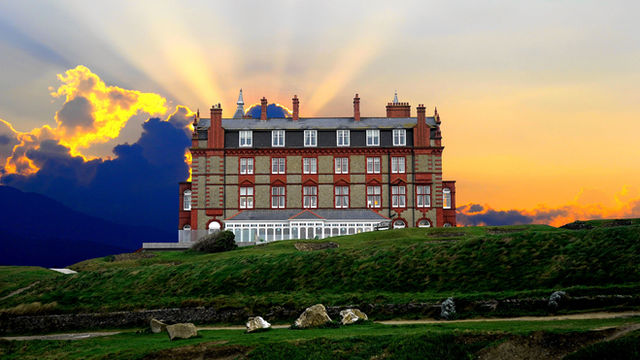 A stunning hotel exterior during sunset, located in Newquay, Cornwall.