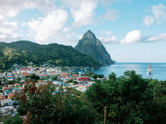 a view of a city with a mountain in the background