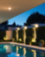 please make an aestethic light image of a backyard with outdoor modern lighting and a pool