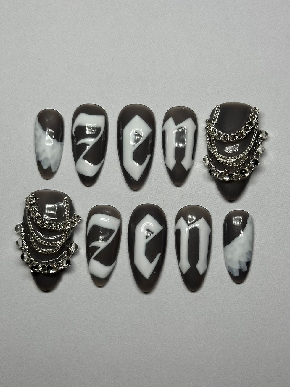 Thumbnail: grey chains angel wings gothic lettering press on nails