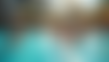 A vibrant hotel pool area with families enjoying their time together